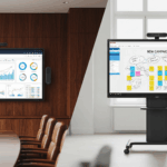 A split-image showcasing a Ricoh interactive whiteboard from Repro Ltd, wall-mounted in a professional Lusaka boardroom on the left, and on a mobile stand in a creative office on the right.