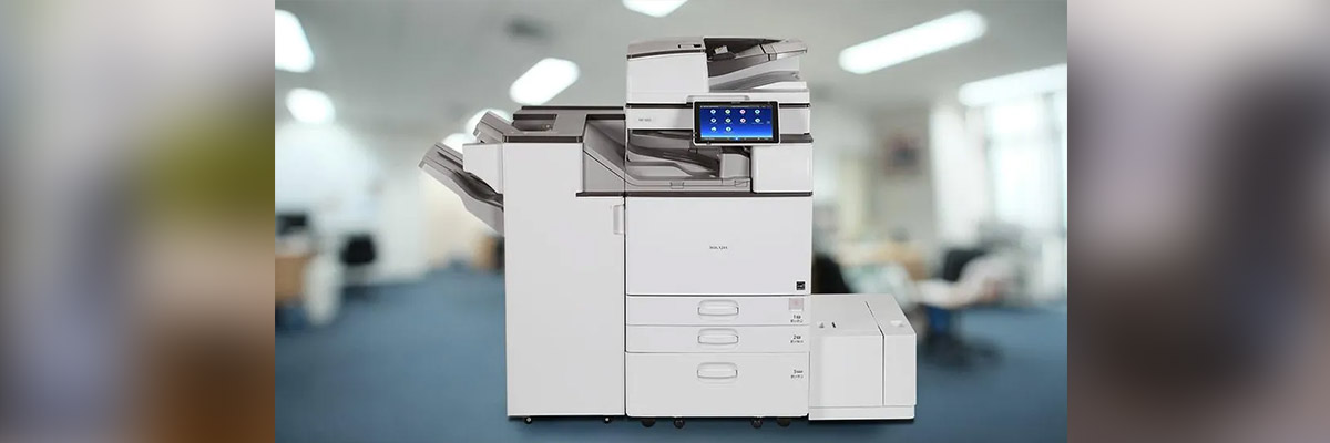 Printer & Copier Rentals Zambia | Short-Term Hire & Corporate Leases Ricoh multifunction printer in a modern corporate office